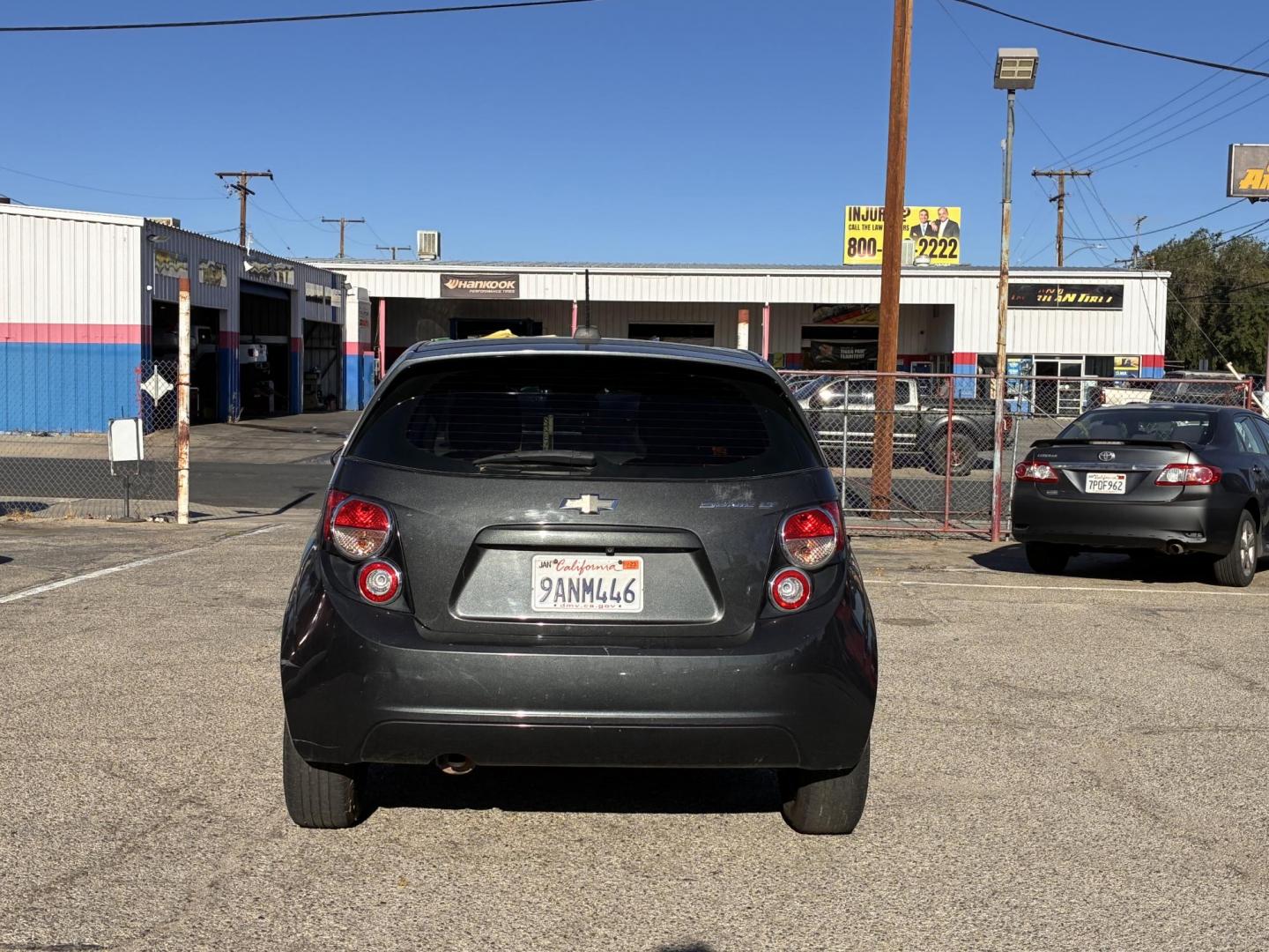 2016 Chevrolet Sonic LT Auto 5-Door (1G1JC6SG4G4) with an 1.8L L4 DOHC 24V engine, 6A transmission, located at 44356 Date Ave., Lancaster, CA, 93534, (661) 945-6555, 34.688919, -118.139374 - Photo#2