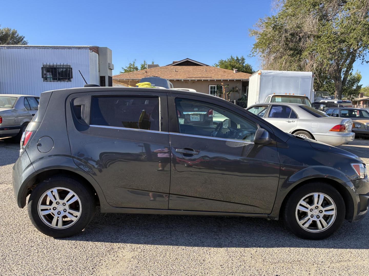 2016 Chevrolet Sonic LT Auto 5-Door (1G1JC6SG4G4) with an 1.8L L4 DOHC 24V engine, 6A transmission, located at 44356 Date Ave., Lancaster, CA, 93534, (661) 945-6555, 34.688919, -118.139374 - Photo#1