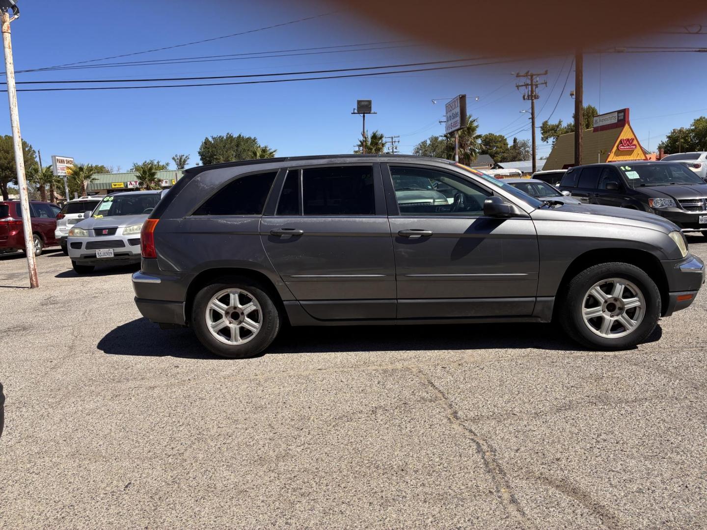 2004 Chrysler Pacifica FWD (2C4GM68424R) with an 3.5L V6 SOHC 24V engine, 4-Speed Automatic Overdrive transmission, located at 44356 Date Ave., Lancaster, CA, 93534, (661) 945-6555, 34.688919, -118.139374 - Photo#2