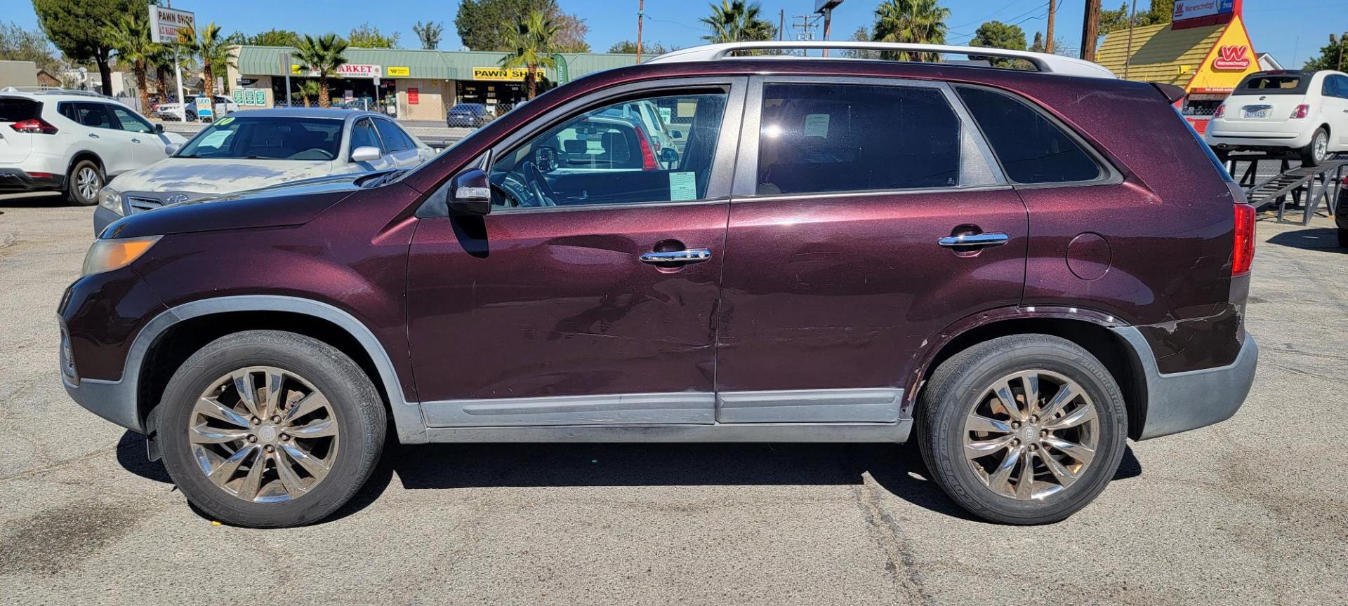 2011 Kia Sorento EX V6 2WD (5XYKU4A21BG) with an 3.5L V6 DOHC 24V engine, 6-Speed Automatic transmission, located at 44356 Date Ave., Lancaster, CA, 93534, (661) 945-6555, 34.688919, -118.139374 - Photo#1