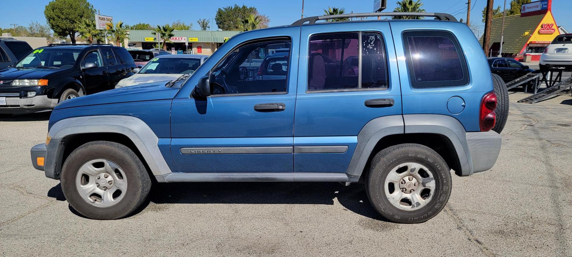 2006 Jeep Liberty Sport 2WD (1J4GK48K76W) with an 3.7L V6 SOHC 12V engine, AUTO transmission, located at 44356 Date Ave., Lancaster, CA, 93534, (661) 945-6555, 34.688919, -118.139374 - Photo#2