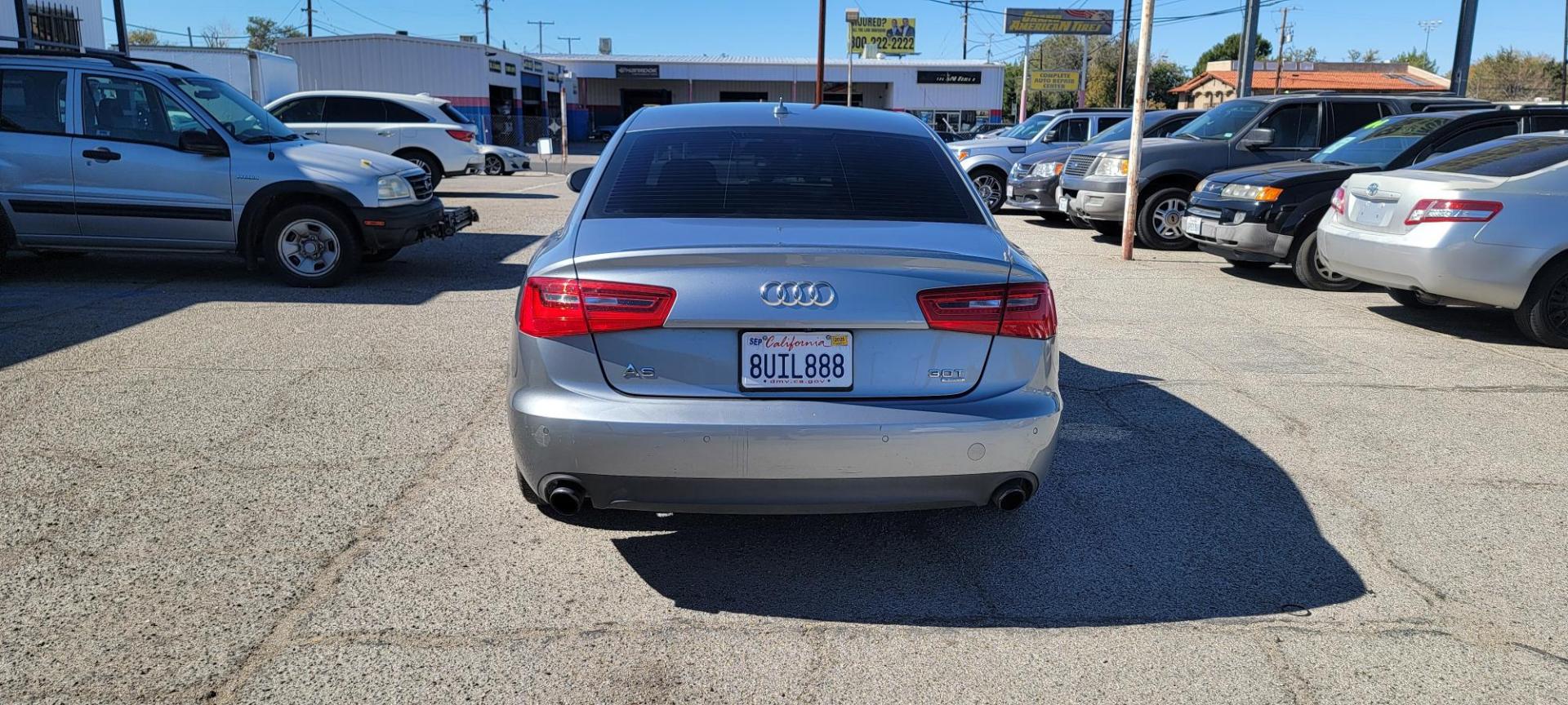 2012 Audi A6 3.0T quattro Tiptronic (WAUGGAFC2CN) with an 3.0L V6 DOHC 24V TURBO engine, 6-Speed Automatic transmission, located at 44356 Date Ave., Lancaster, CA, 93534, (661) 945-6555, 34.688919, -118.139374 - Photo#3