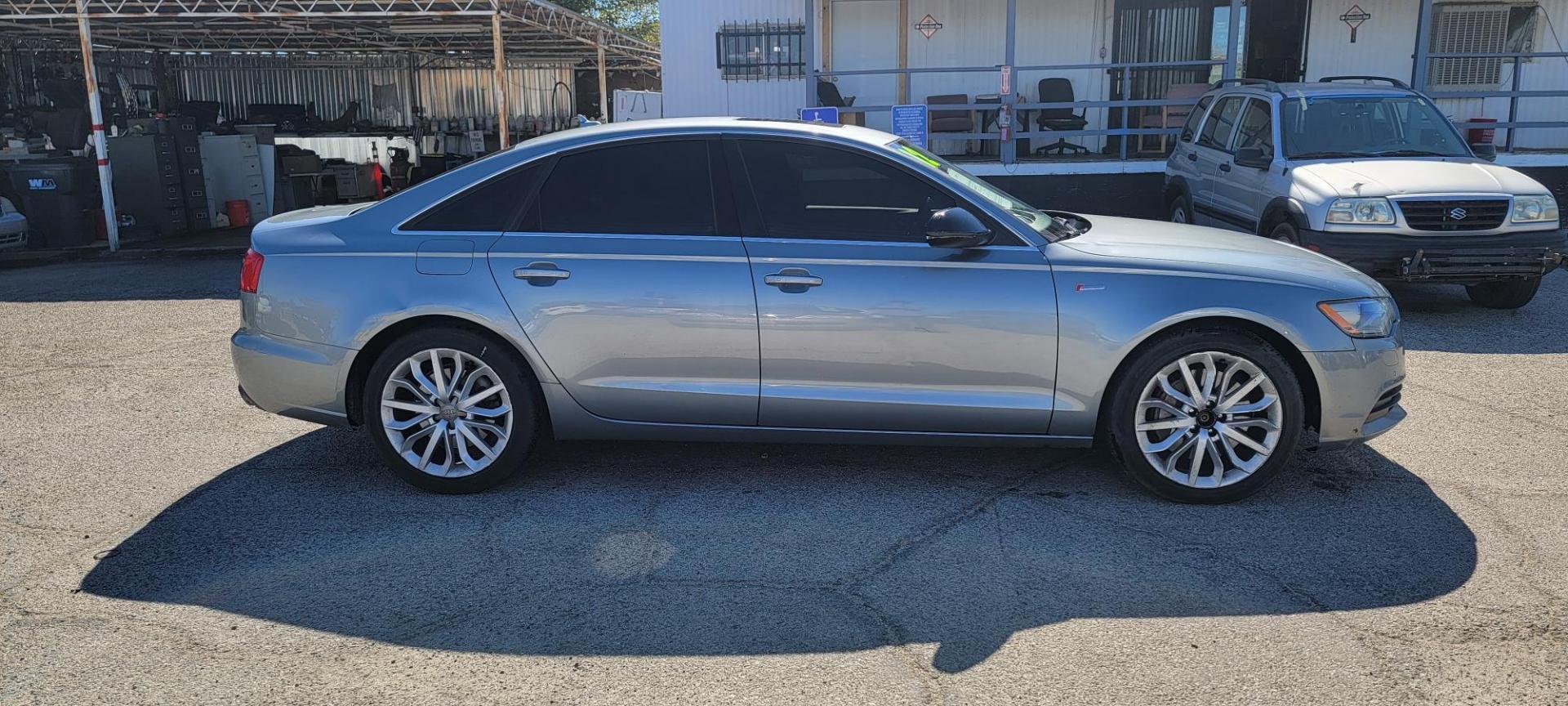 2012 Audi A6 3.0T quattro Tiptronic (WAUGGAFC2CN) with an 3.0L V6 DOHC 24V TURBO engine, 6-Speed Automatic transmission, located at 44356 Date Ave., Lancaster, CA, 93534, (661) 945-6555, 34.688919, -118.139374 - Photo#2