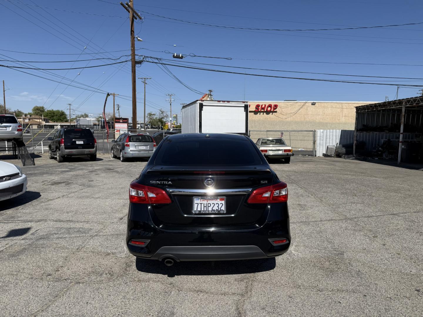 2016 Nissan Sentra FE+ S (3N1AB7AP2GY) with an 1.8L L4 SFI DOHC 16V engine, CVT transmission, located at 44356 Date Ave., Lancaster, CA, 93534, (661) 945-6555, 34.688919, -118.139374 - Photo#3