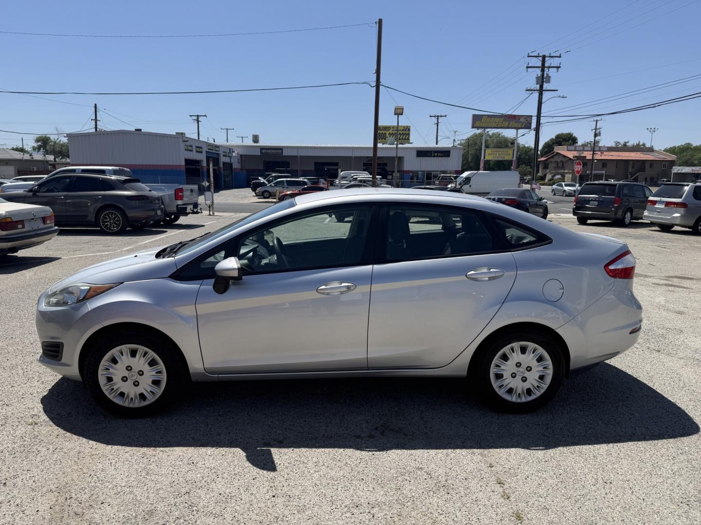 2017 Ford Fiesta S Sedan (3FADP4AJ3HM) with an 1.6L L4 DOHC 16V engine, MANUAL transmission, located at 44356 Date Ave., Lancaster, CA, 93534, (661) 945-6555, 34.688919, -118.139374 - Photo#2