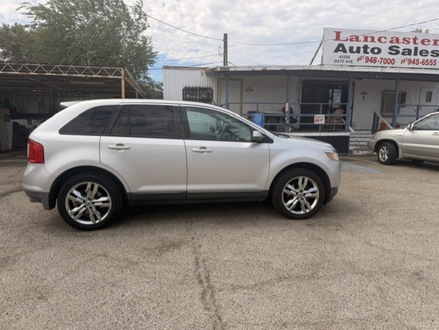 2012 /BLACK Ford Edge SEL FWD (2FMDK3JC0CB) with an 3.5L V6 DOHC 24V engine, 6-Speed Automatic transmission, located at 44356 Date Ave., Lancaster, CA, 93534, (661) 945-6555, 34.688919, -118.139374- Photo#0