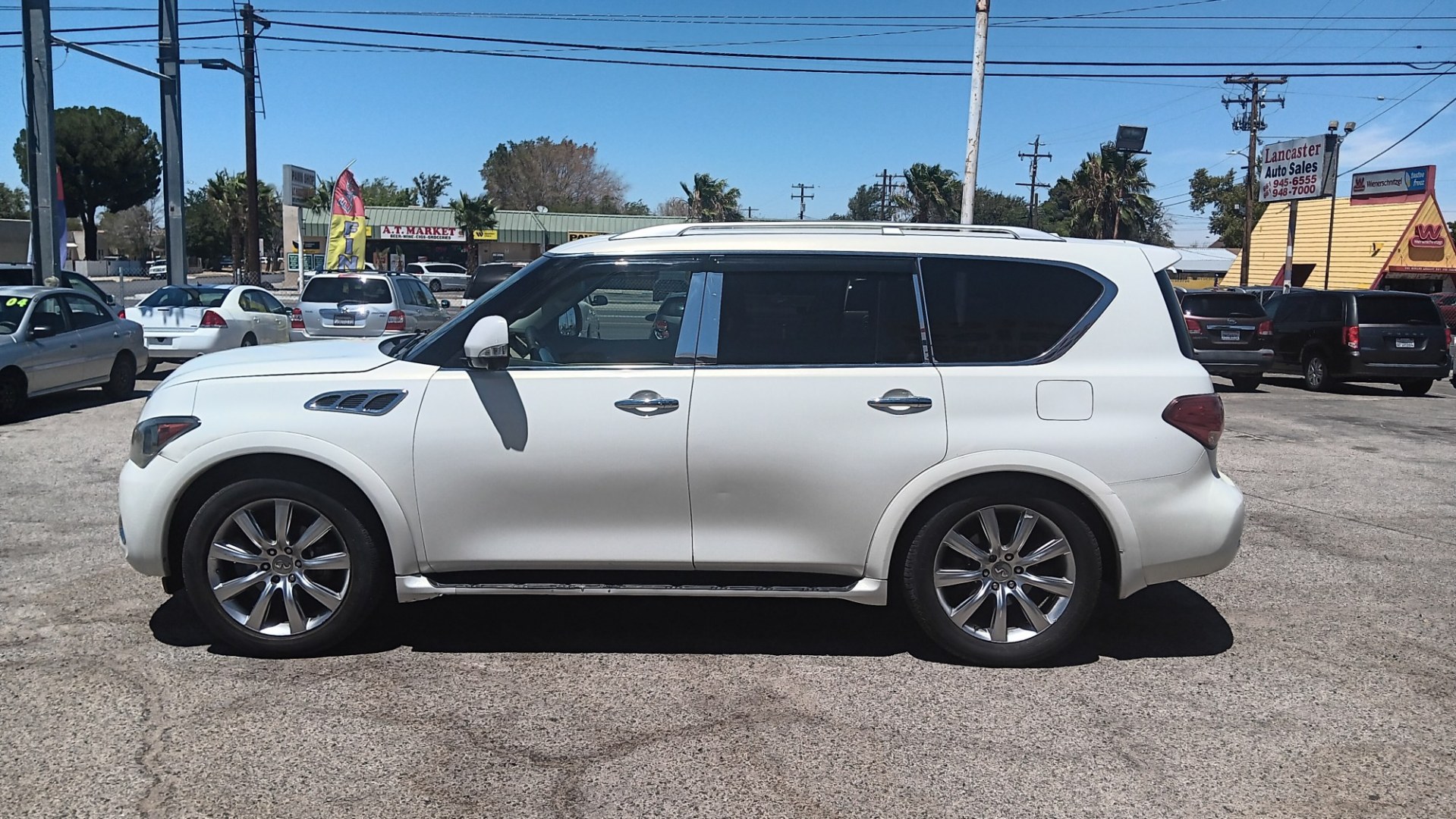 2011 WHITE Infiniti QX56 2WD (JN8AZ2ND3B9) with an 5.6L V8 DOHC 32V engine, 5A transmission, located at 44356 Date Ave., Lancaster, CA, 93534, (661) 945-6555, 34.688919, -118.139374- Photo#1