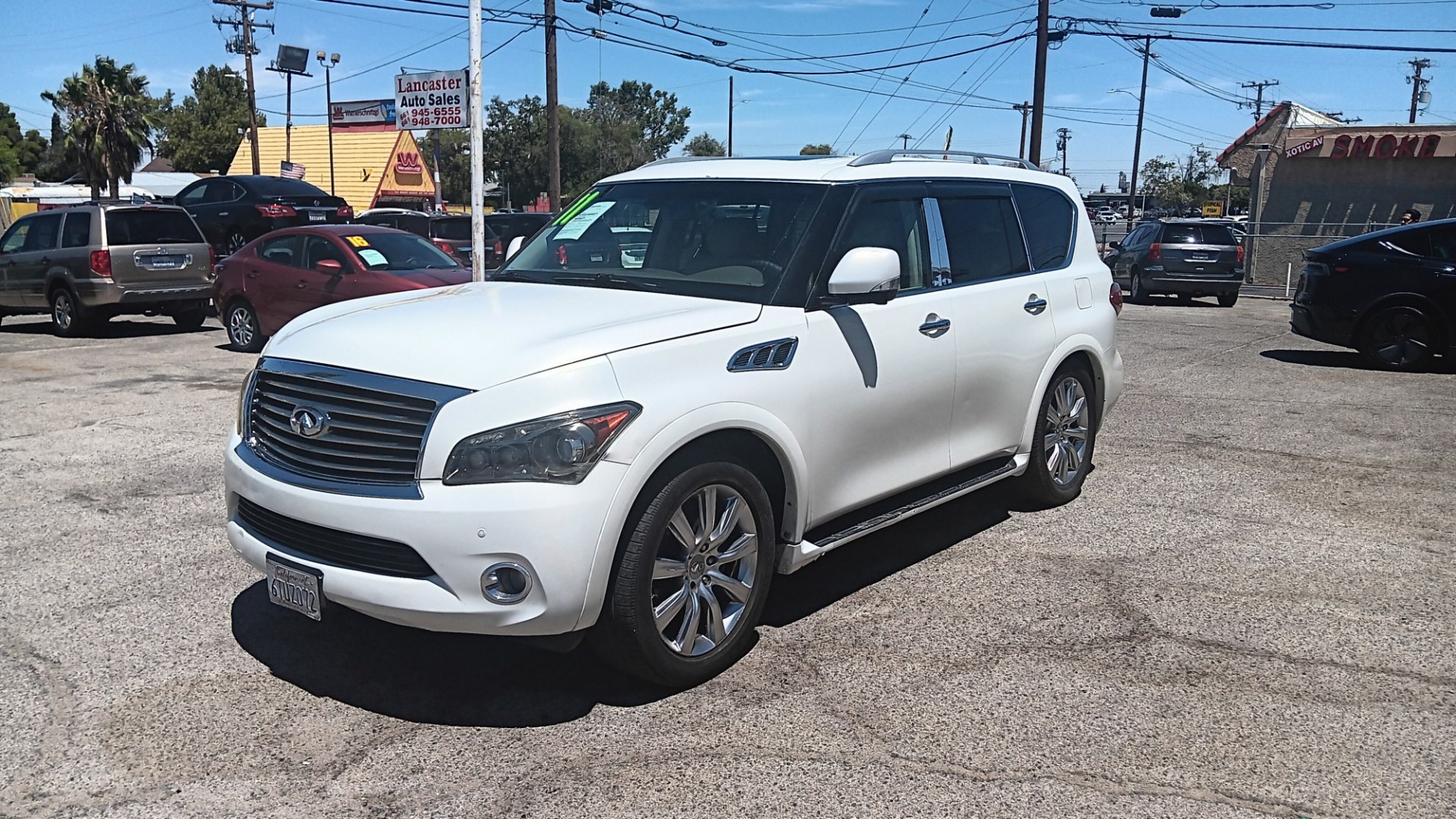 2011 WHITE Infiniti QX56 2WD (JN8AZ2ND3B9) with an 5.6L V8 DOHC 32V engine, 5A transmission, located at 44356 Date Ave., Lancaster, CA, 93534, (661) 945-6555, 34.688919, -118.139374- Photo#0