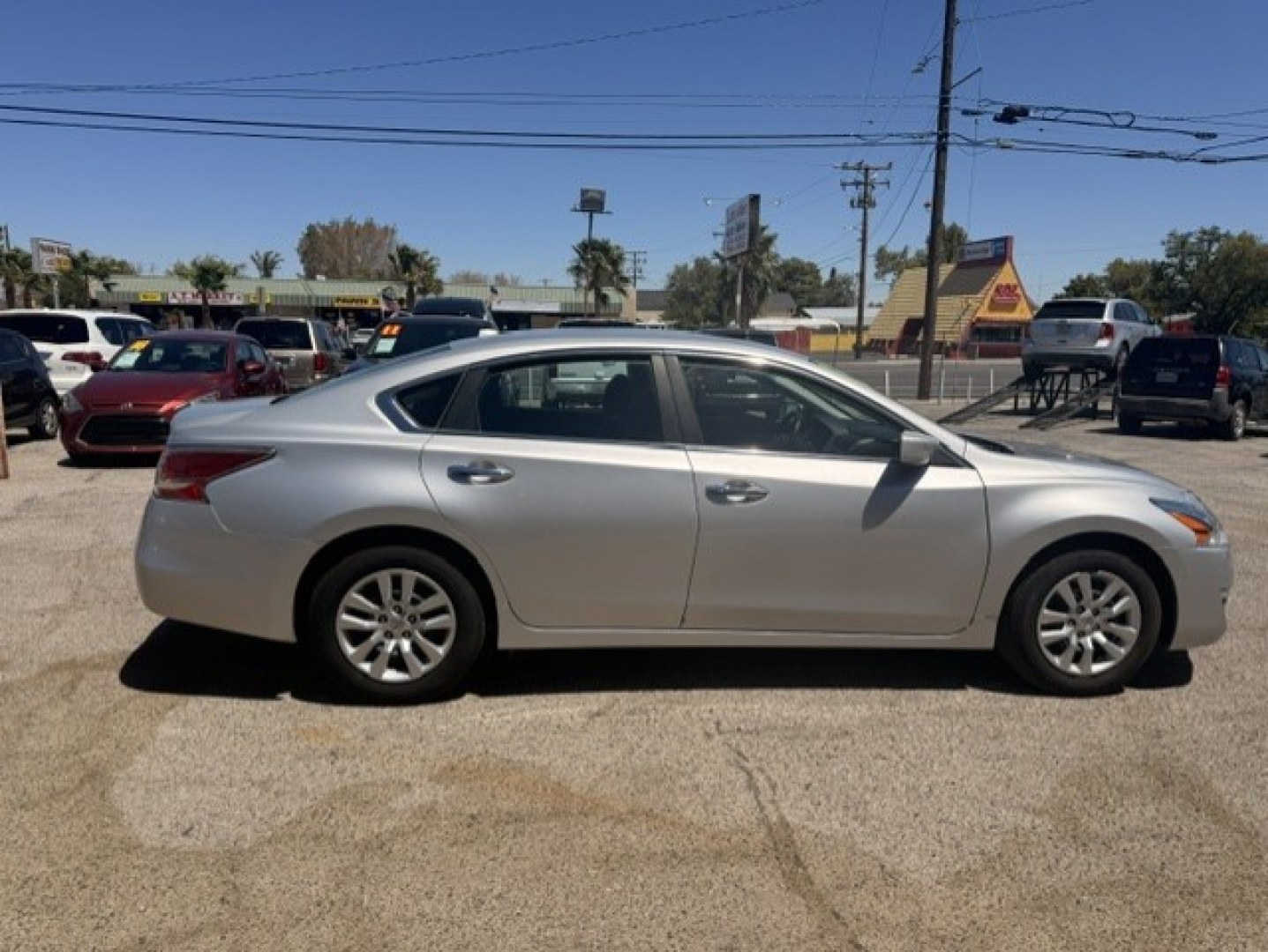 2015 Nissan Altima 2.5 S (1N4AL3AP3FN) with an 2.5L L4 DOHC 16V engine, CVT transmission, located at 44356 Date Ave., Lancaster, CA, 93534, (661) 945-6555, 34.688919, -118.139374- Photo#1